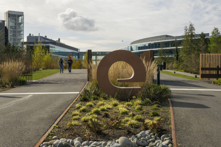 expedia symbol at pathway to entrance to expedia headquarters in seattle source zgf