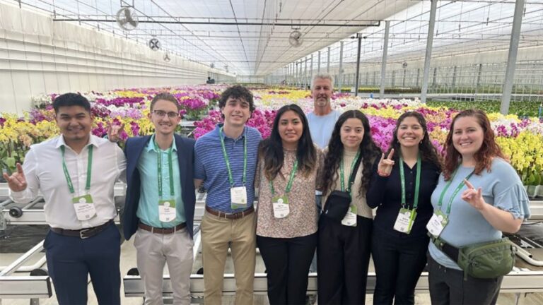 Horticultural science students with Assistant Professor Melinda Knuth and Edwin Knijnenburg head grower at Floricultura during a trip to the 2025 California Spring Trials